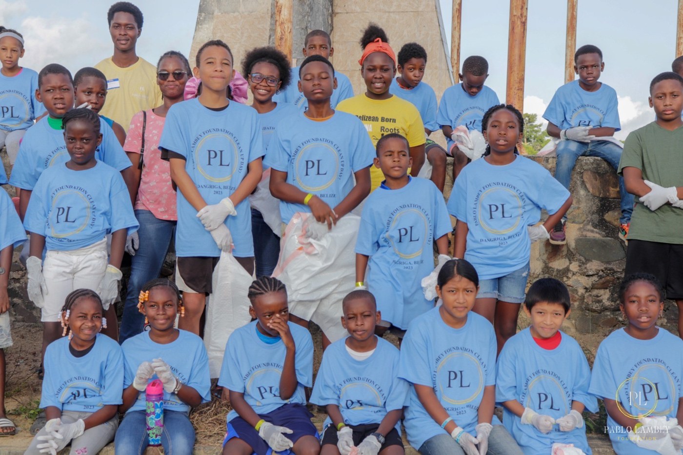 Students at a Pablo Lambey Foundation community clean-up day in Dangriga, Belize
